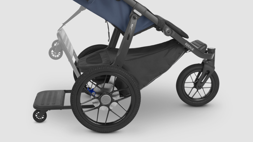 PiggyBack attached to Ridge Stroller showing lifting option