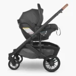 Mesa V2 infant car seat attached to Cruz V2 Stroller both in Greyson fashion