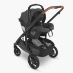 Mesa V2 infant car seat attached to Cruz V2 Stroller both in Greyson fashion