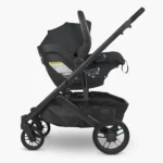 Mesa V2 infant car seat attached to Cruz V2 Stroller both in Jake fashion