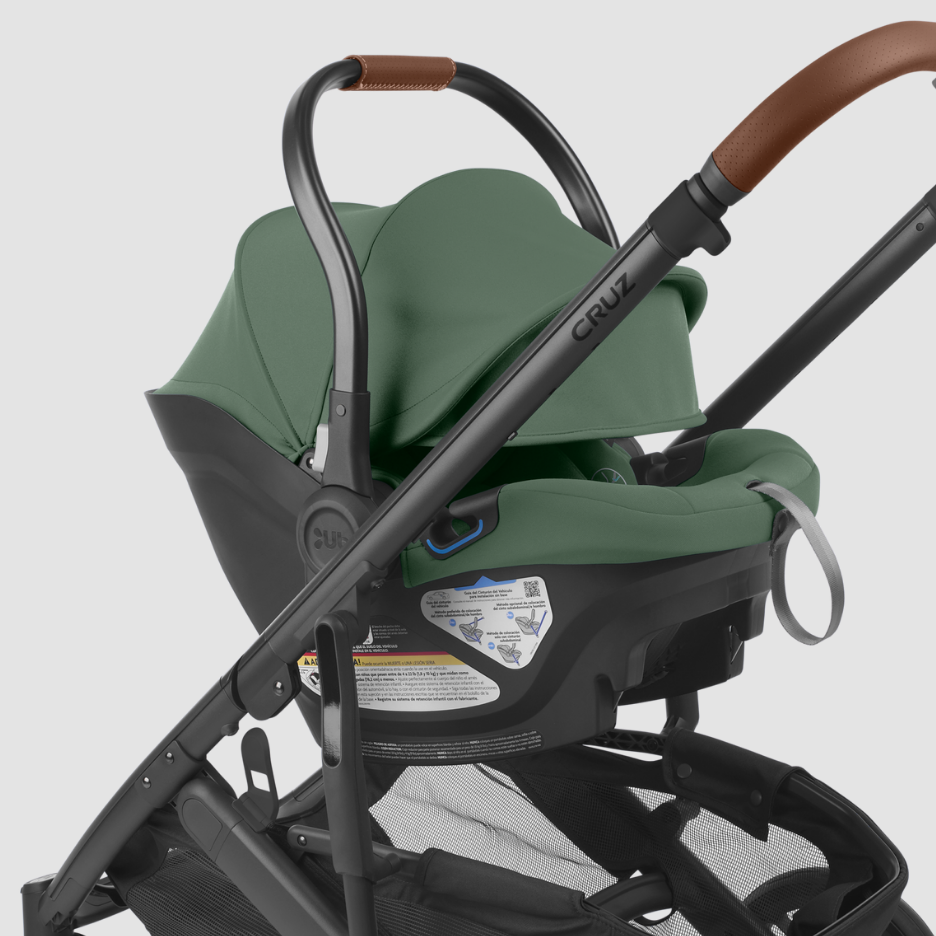 Close up of Aria infant car seat attached to Cruz V2 stroller both in Gwen