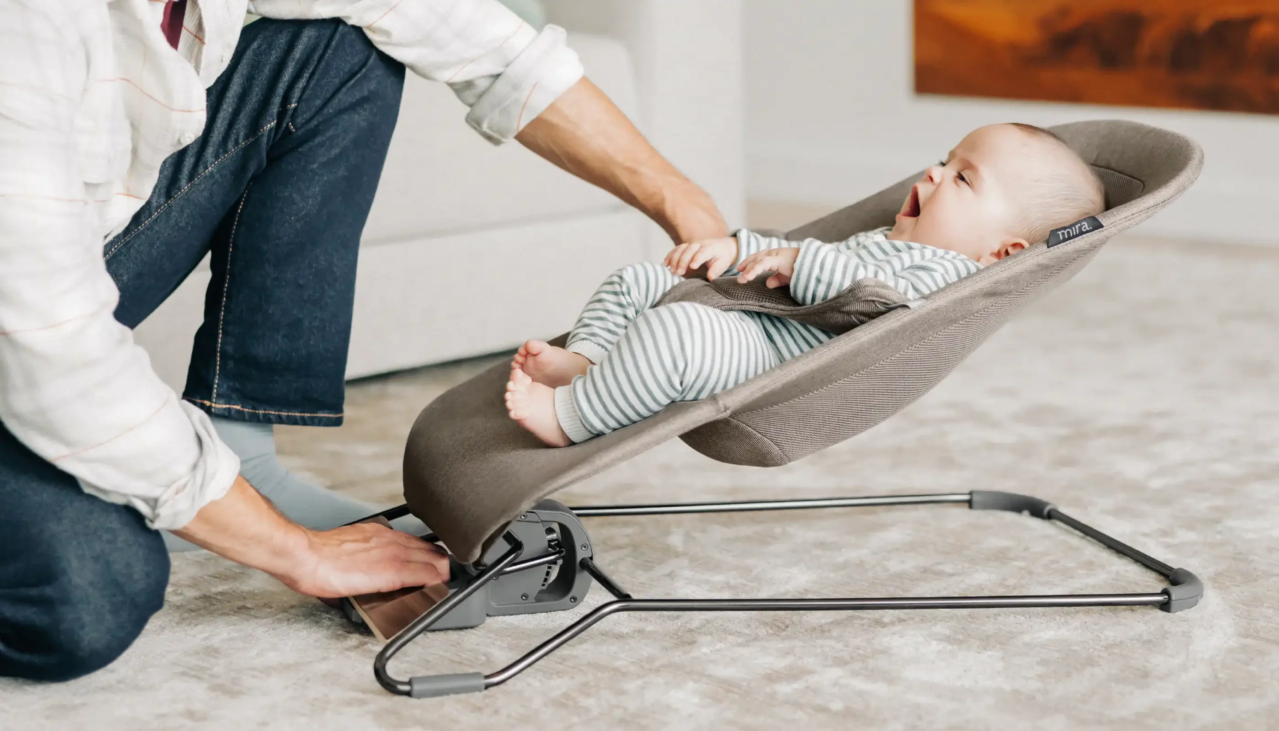 The Mira bouncer includes a parent-facing recline with three different adjustment levels, making it simple and easy for a prent to adjust as a baby grows