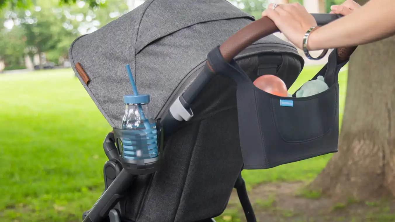 Cup holder for Vista, Cruz, & Minu attached to stroller with water cup