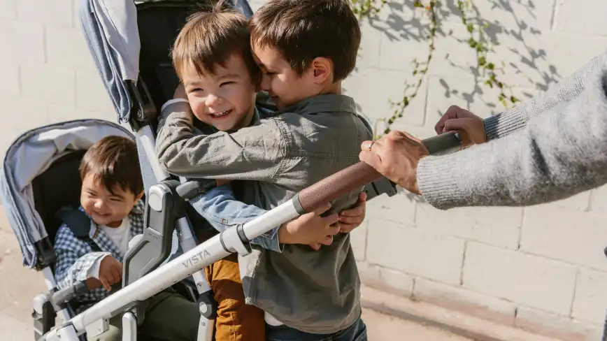 Strolling with child on PiggyBack and parent-facing Toddler Seat