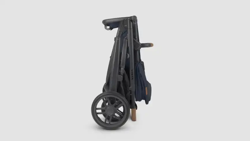 Strolller folded with adapters attached