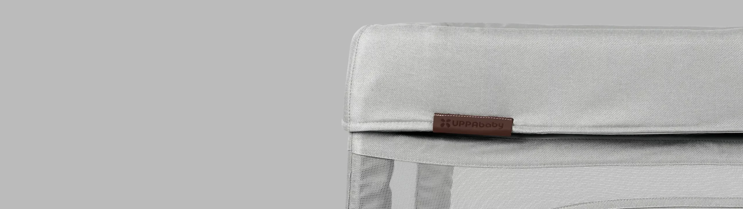 Closeup of UPPAbaby logo on Remi playard