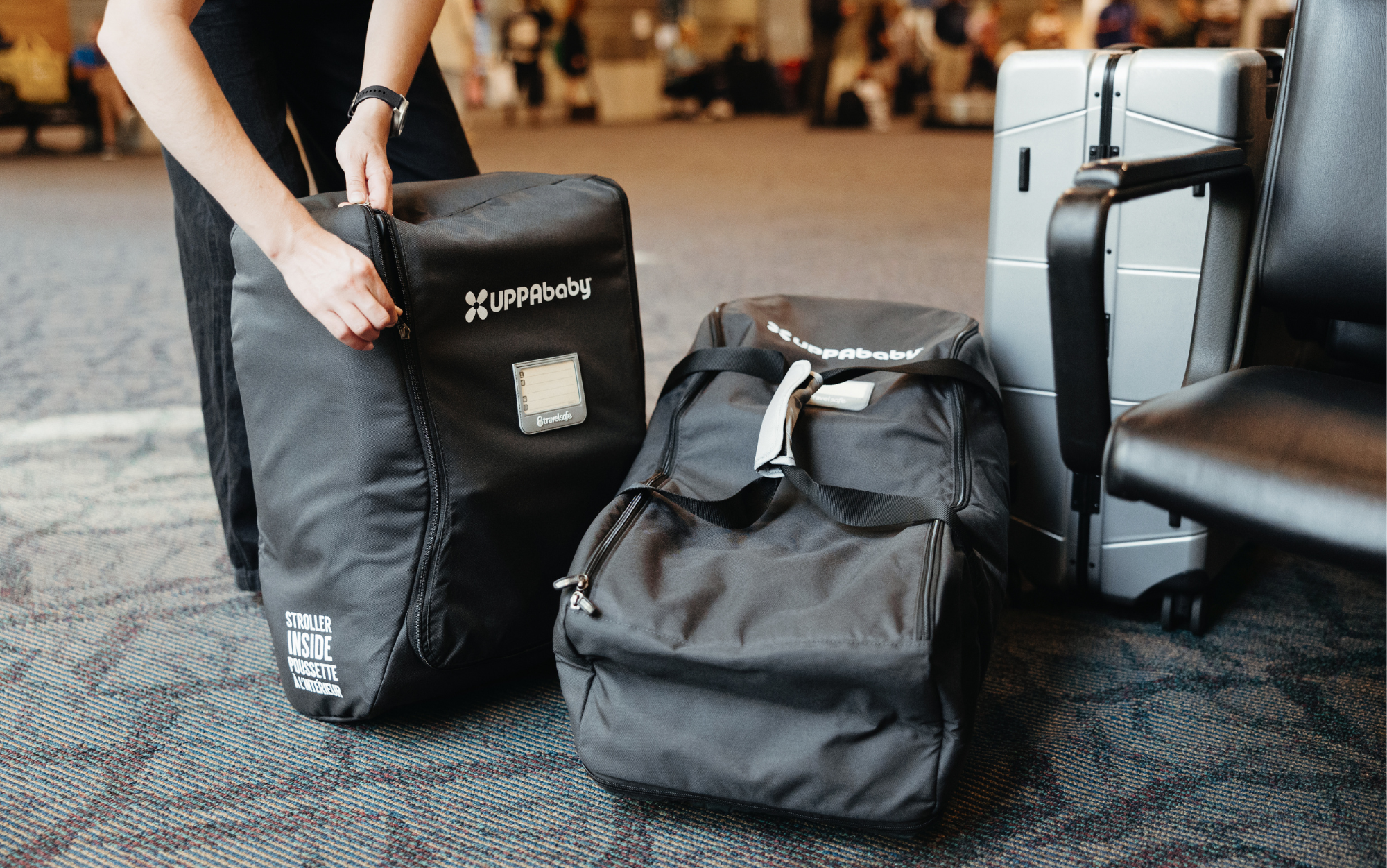 Minu V2 Travel bag alongside Aria Travel Bag at airport